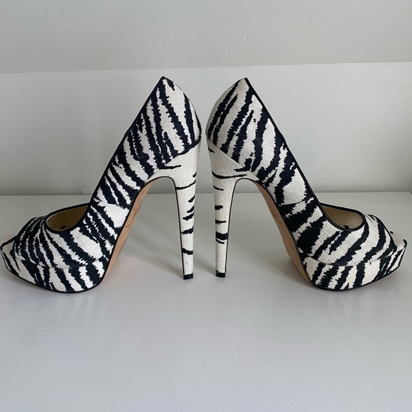 Brian Atwood Linen Zebra Print Open Toe Platform Pump
w/ Leather trim. - Picture 3 of 5